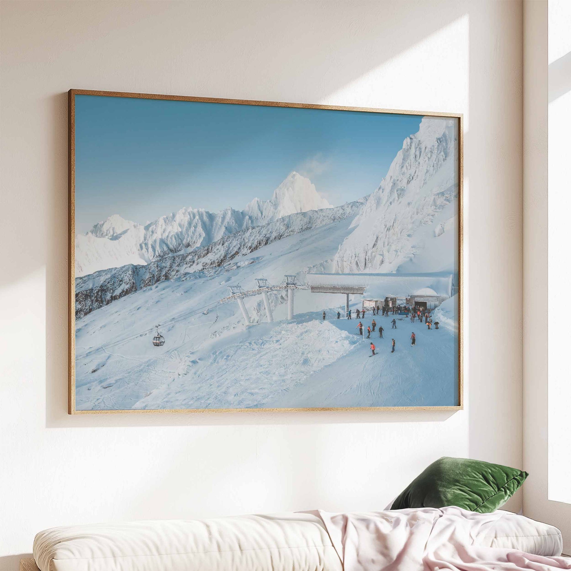 Wall art of the Bochard lift station at Grand Montets with snowy mountain views.