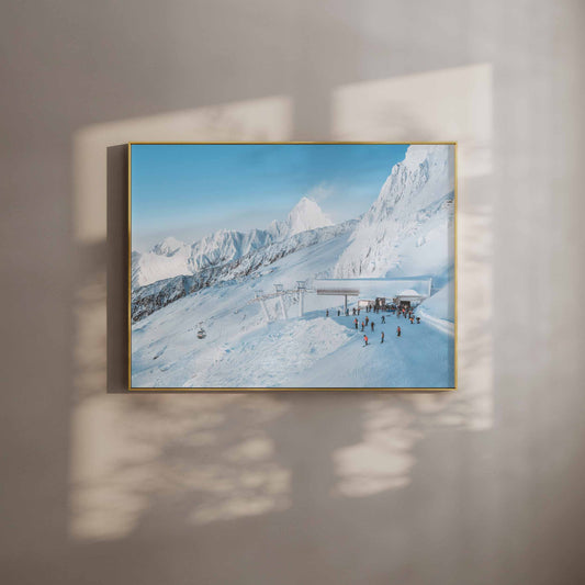 Bochard ski lift station at Grand Montets in winter, surrounded by snowy peaks.