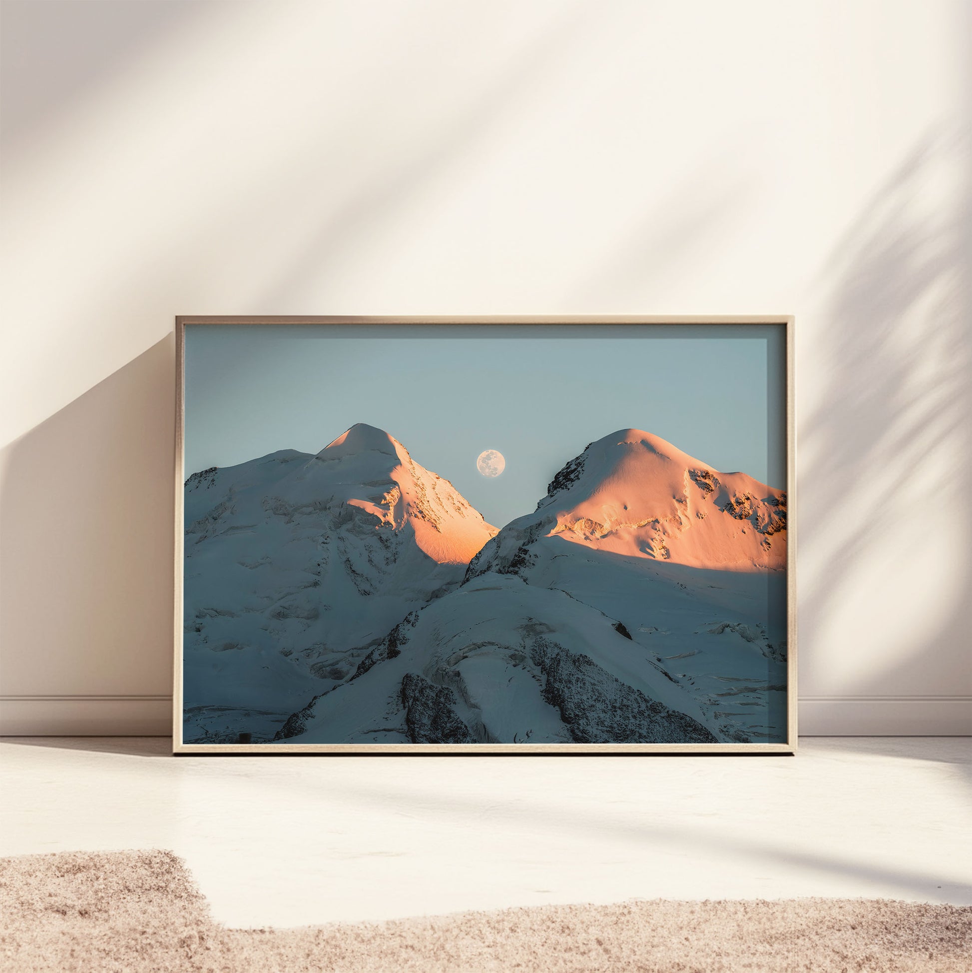 Castor and Pollux mountain wall art leaning against a wall in a sunlit room, highlighting evening glow and natural beauty.