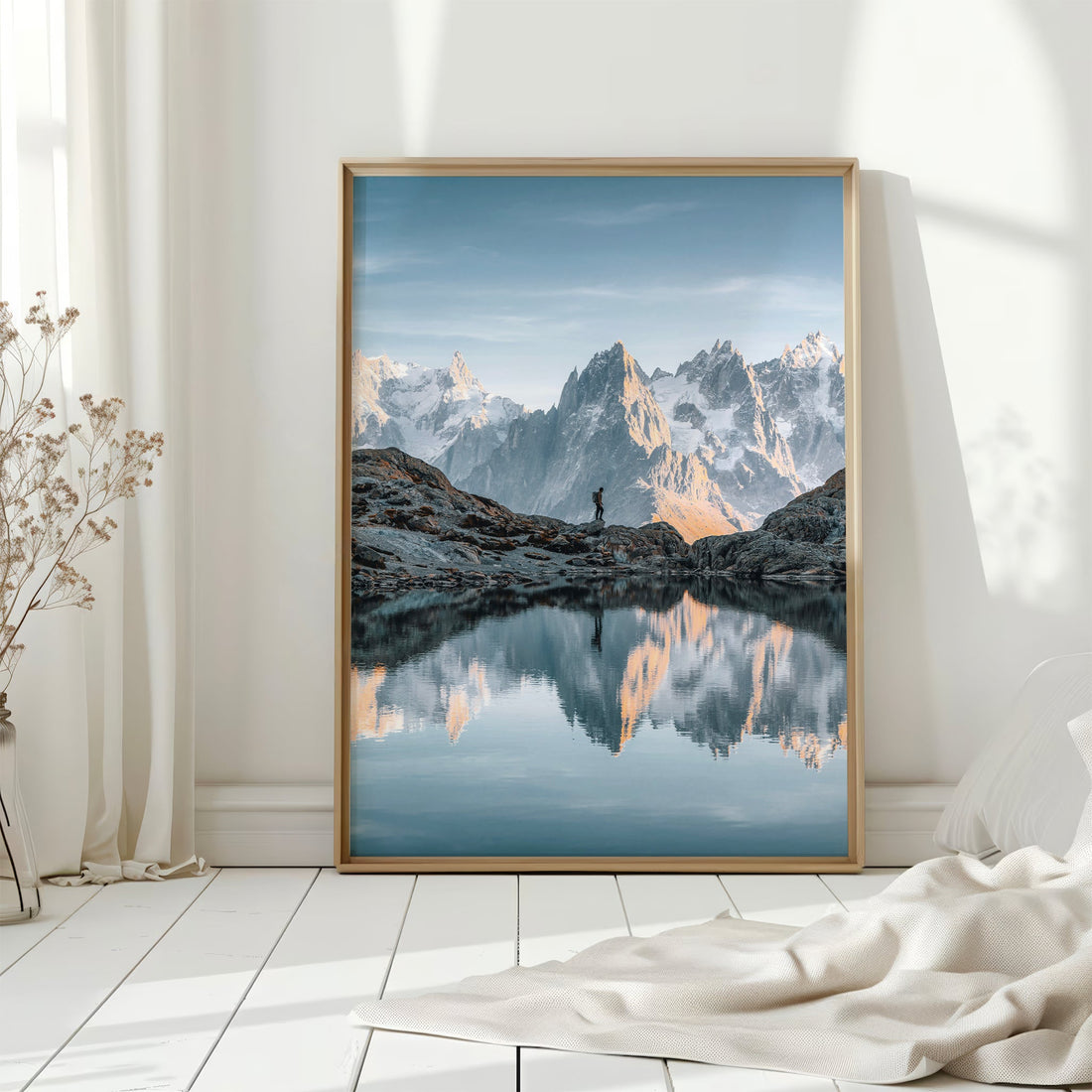 A mesmerizing glacier-fed lake in Chamonix, framed by rugged mountain peaks and golden light.