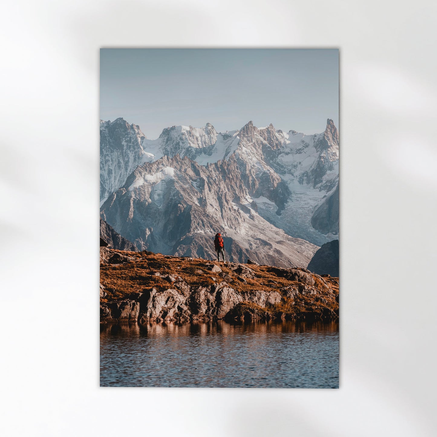 Chamonix alpine landscape print with a lone hiker enjoying breathtaking glacier views.
