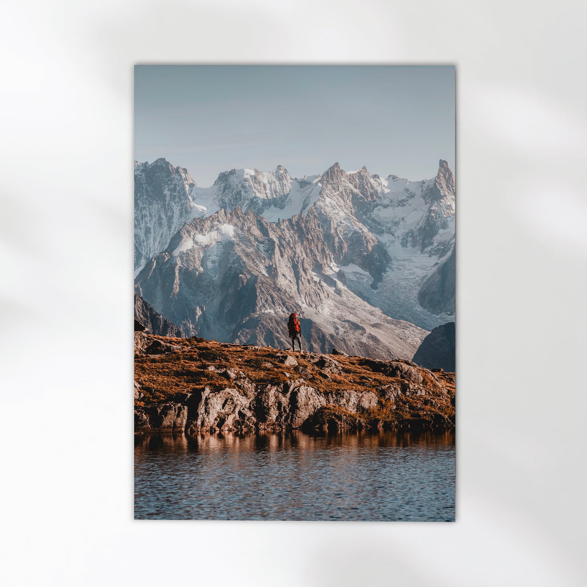 Chamonix alpine landscape print with a lone hiker enjoying breathtaking glacier views.
