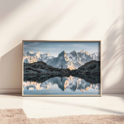 Refined Chamonix Lac Blanc print in a light wood frame, styled leaning against a wall with soft shadows.