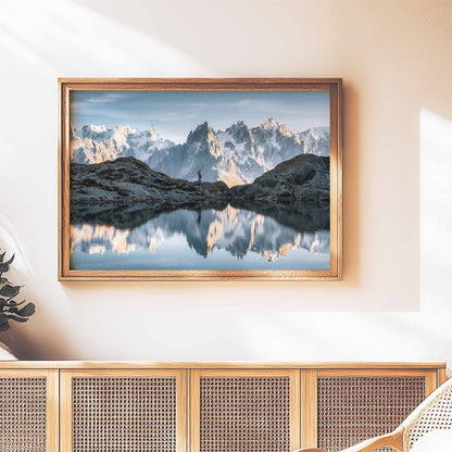 Wall art print of Lac Blanc in Chamonix, framed and mounted on a textured wood backdrop in a sunny space.