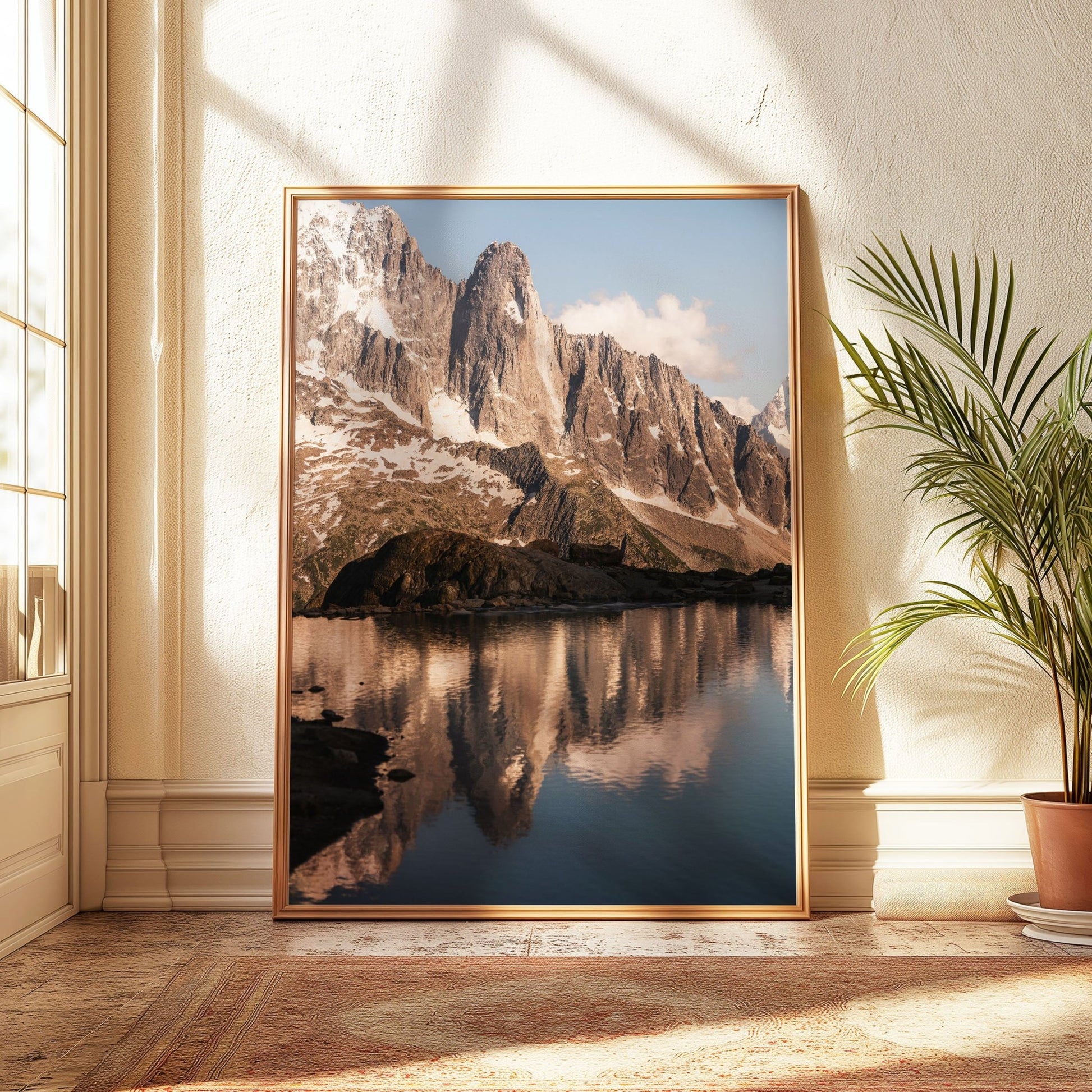 Rocky foreground with the golden hues of the Chamonix needles at sunset.