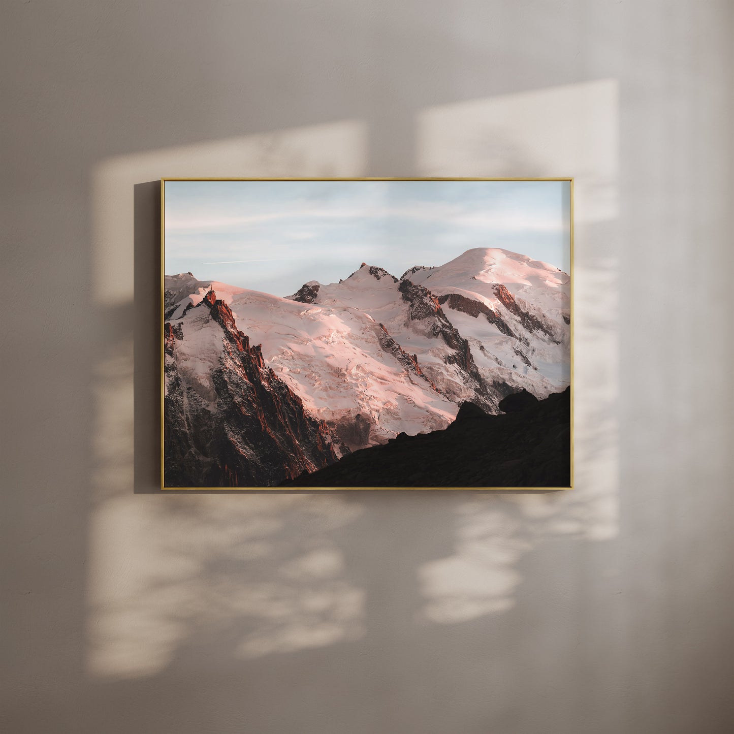 Wall art print of sunset illuminating the Mont Blanc massif in Chamonix, framed against a soft backdrop