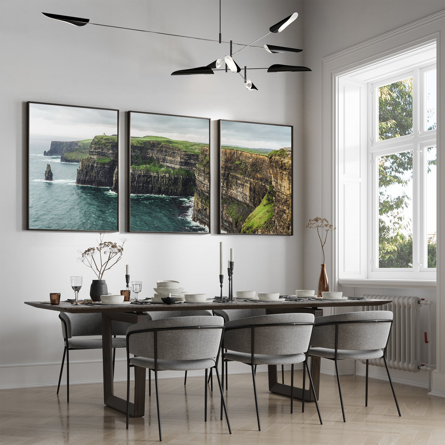 Large triptych print of Cliffs of Moher hanging in elegant dining room