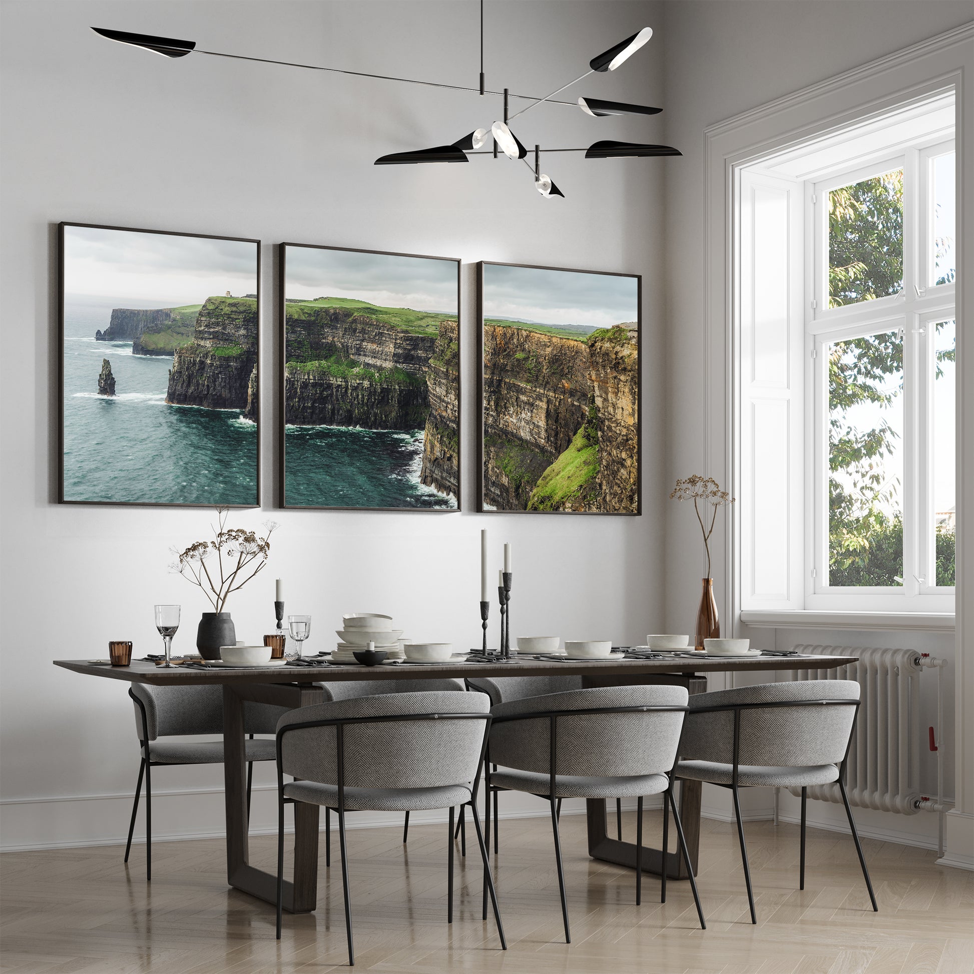 Large triptych print of Cliffs of Moher hanging in elegant dining room