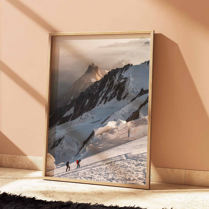 Two climbers scaling Mont Blanc, French Alps, with view of Aiguille du Midi