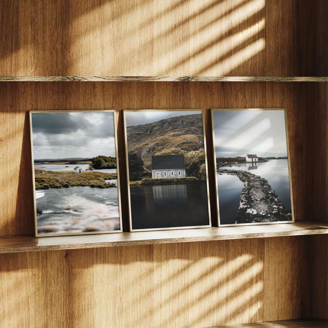 Irish wall art triptych featuring Connemara and Gougane Barra landscapes displayed in a warm wooden interior