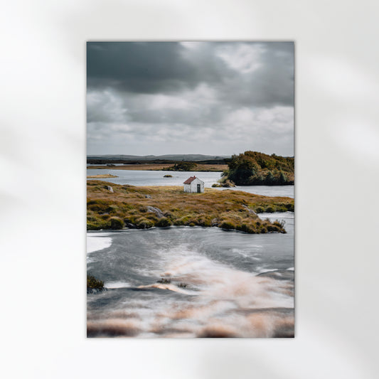Irish landscape wall art featuring a solitary cottage on an island in Connemara
