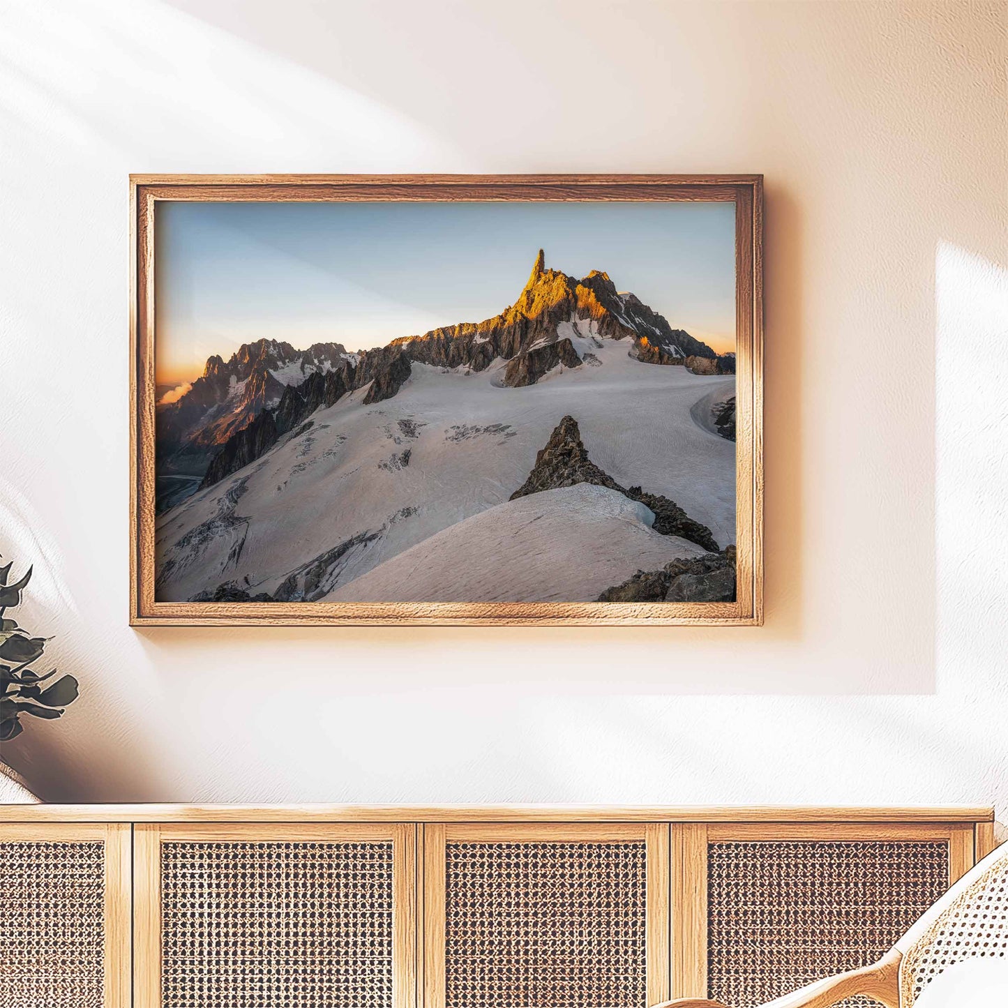 Dent du Géant at sunset, captured in a stunning print displayed in a warm, wooden frame.