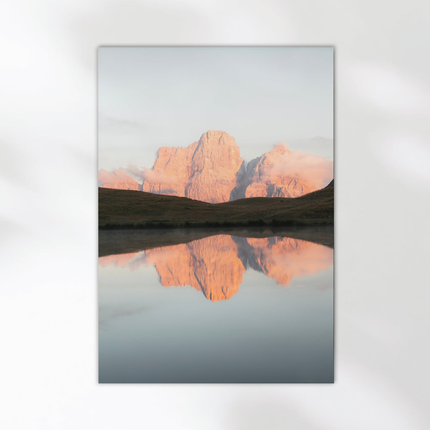 Soft light over Italian Dolomites reflecting in alpine lake