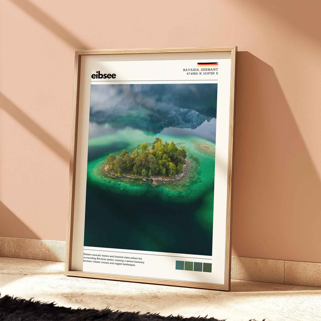 Eibsee aerial island Bavaria Germany drone photography print in natural wood frame leaning against warm terracotta wall on textured floor