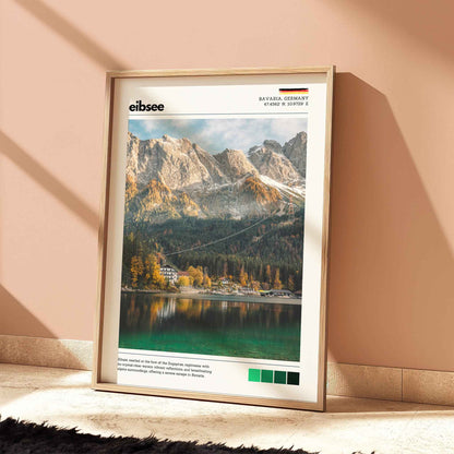 Eibsee autumn Zugspitze Bavaria Germany lake photography print in natural wood frame leaning against warm terracotta wall on textured floor