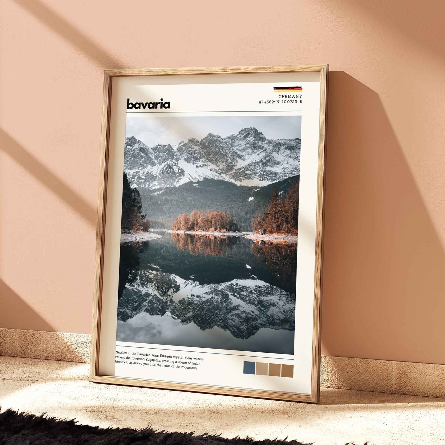 Eibsee Zugspitze Bavaria Germany lake reflection photography print in natural wood frame leaning against warm terracotta wall on textured floor
