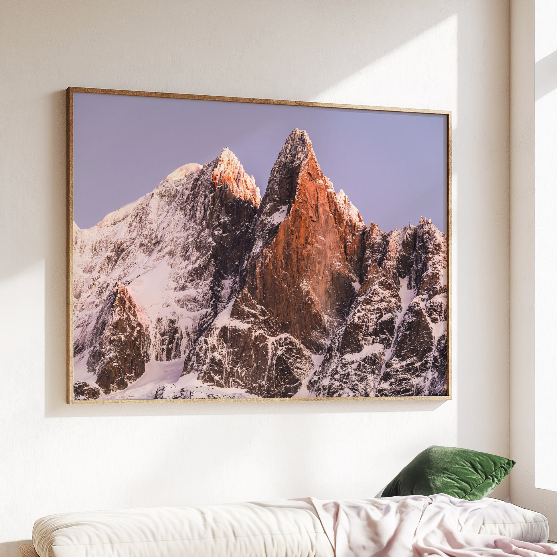 Framed wall art of Les Drus in Chamonix with morning light highlighting the rugged alpine terrain.