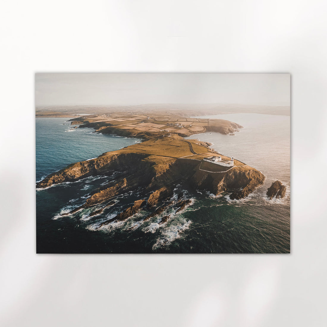 Fine art landscape print of Galley Head lighthouse in soft golden light