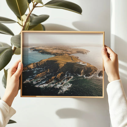 galley-head-lighthouse-print-held-in-hands-coastal-ireland-art
