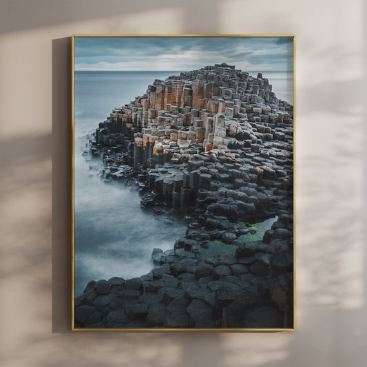 Fine art print of the Giant's Causeway with hexagonal basalt columns and ocean backdrop