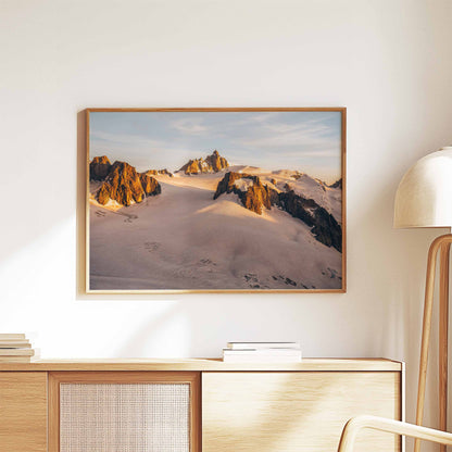 Aiguille du Midi glowing in warm sunlight, captured in a modern art frame for elegant interiors.