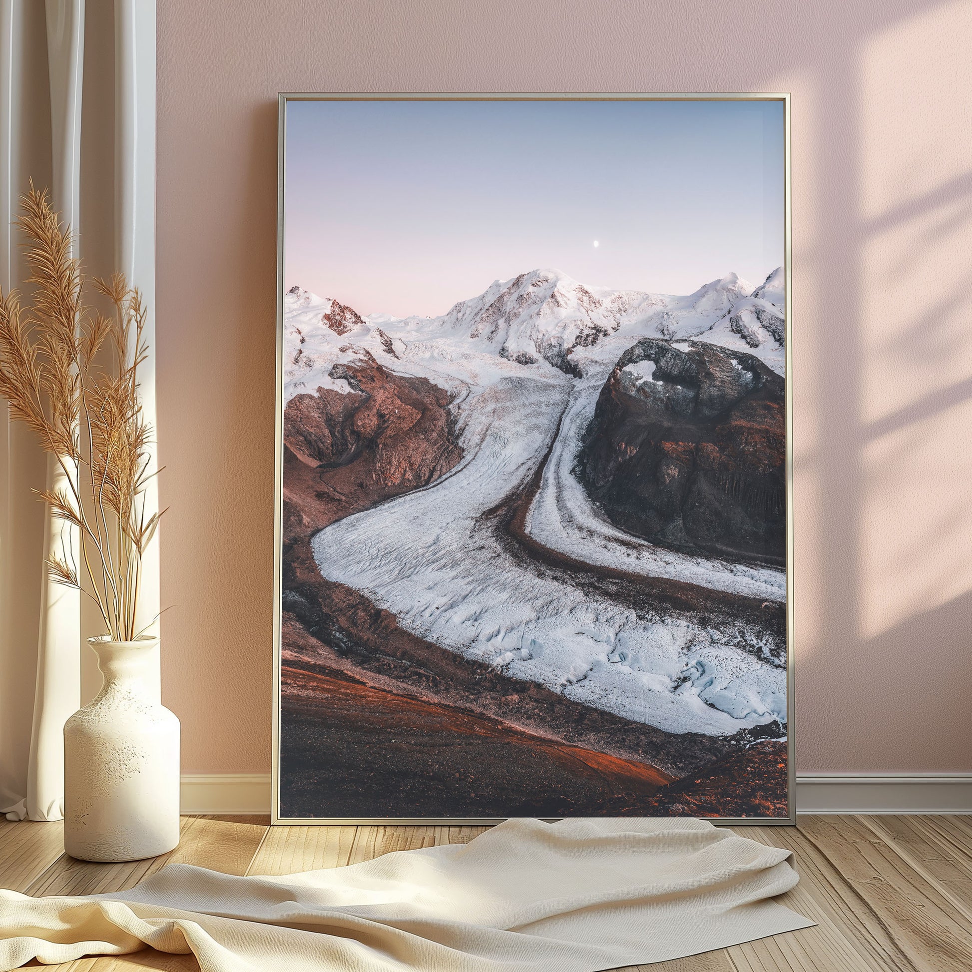 Tranquil scene of Gorner Glacier under a pink and orange sky during twilight.