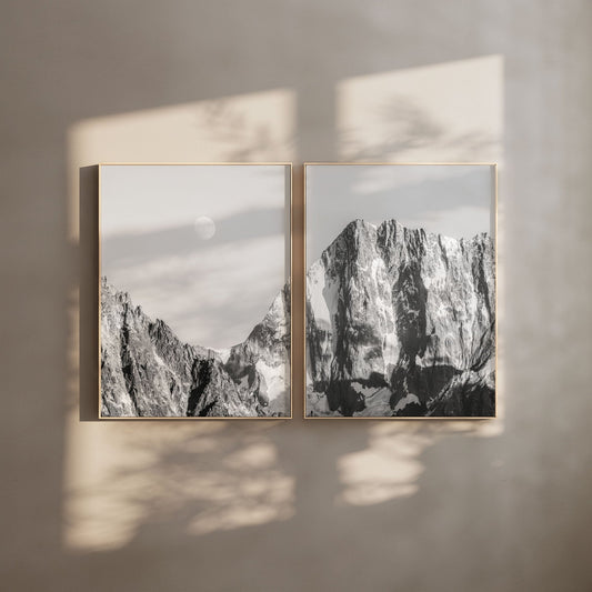 Grandes Jorasses print on a dark wall in a dining area with stylish decor.