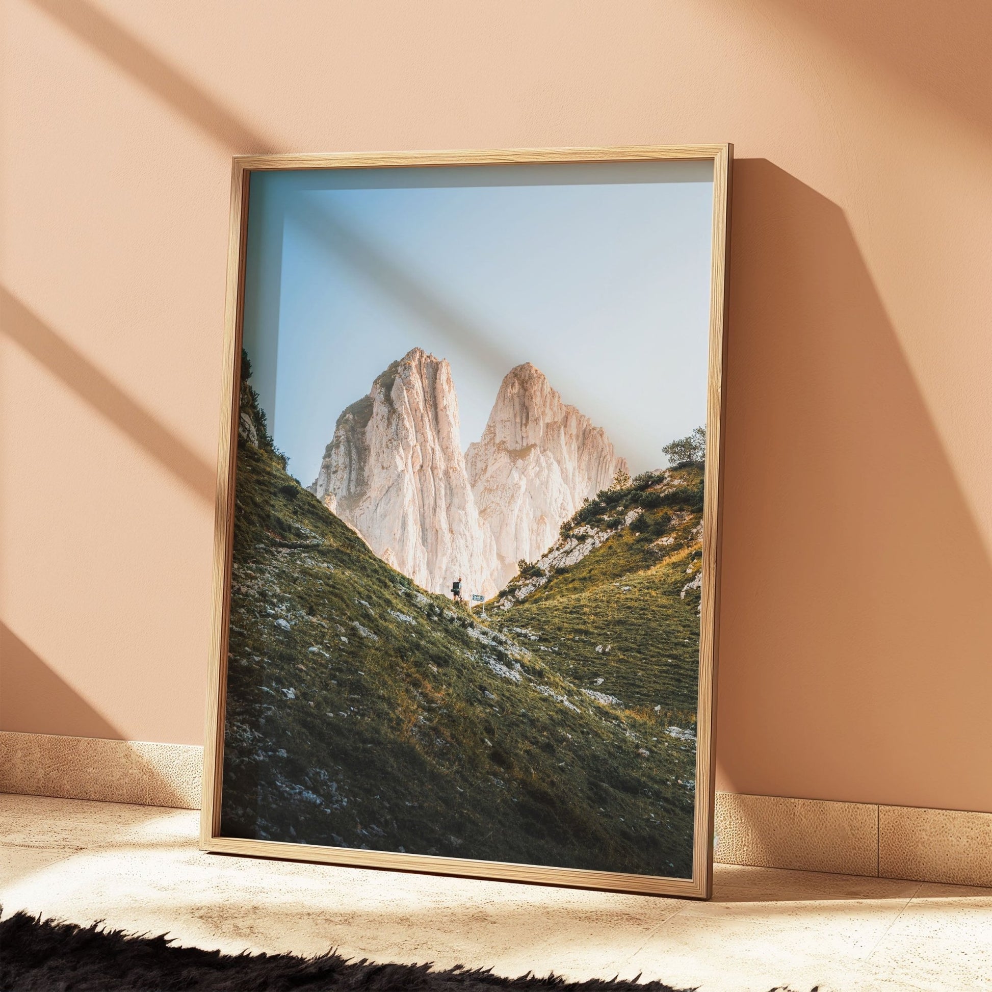 Modern framed artwork of Saxer Lücke hiker scene, Swiss Alps, in warm sunlight