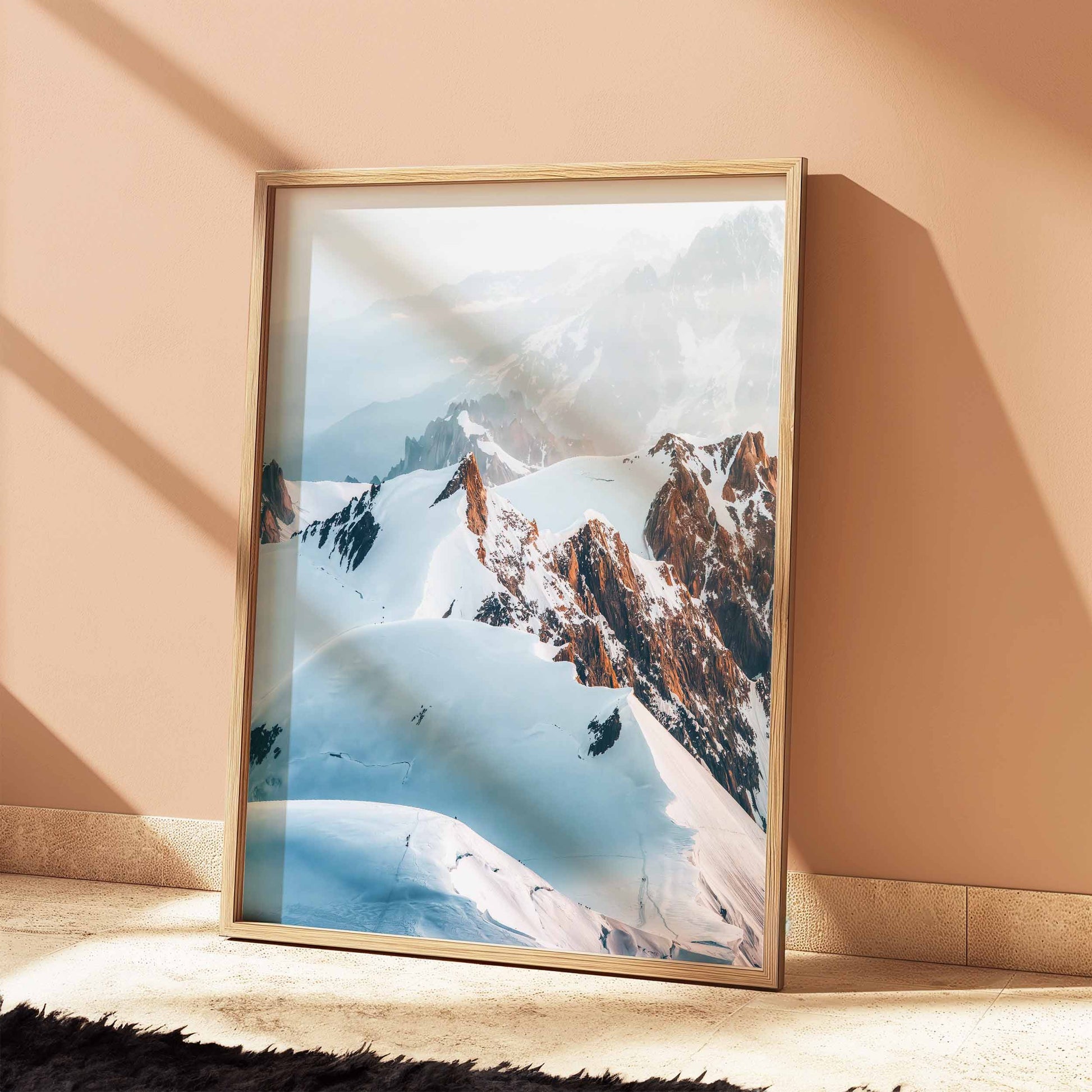 Captivating view of hikers on the Trois Monts route to Mont Blanc summit, framed by the alpine skyline.