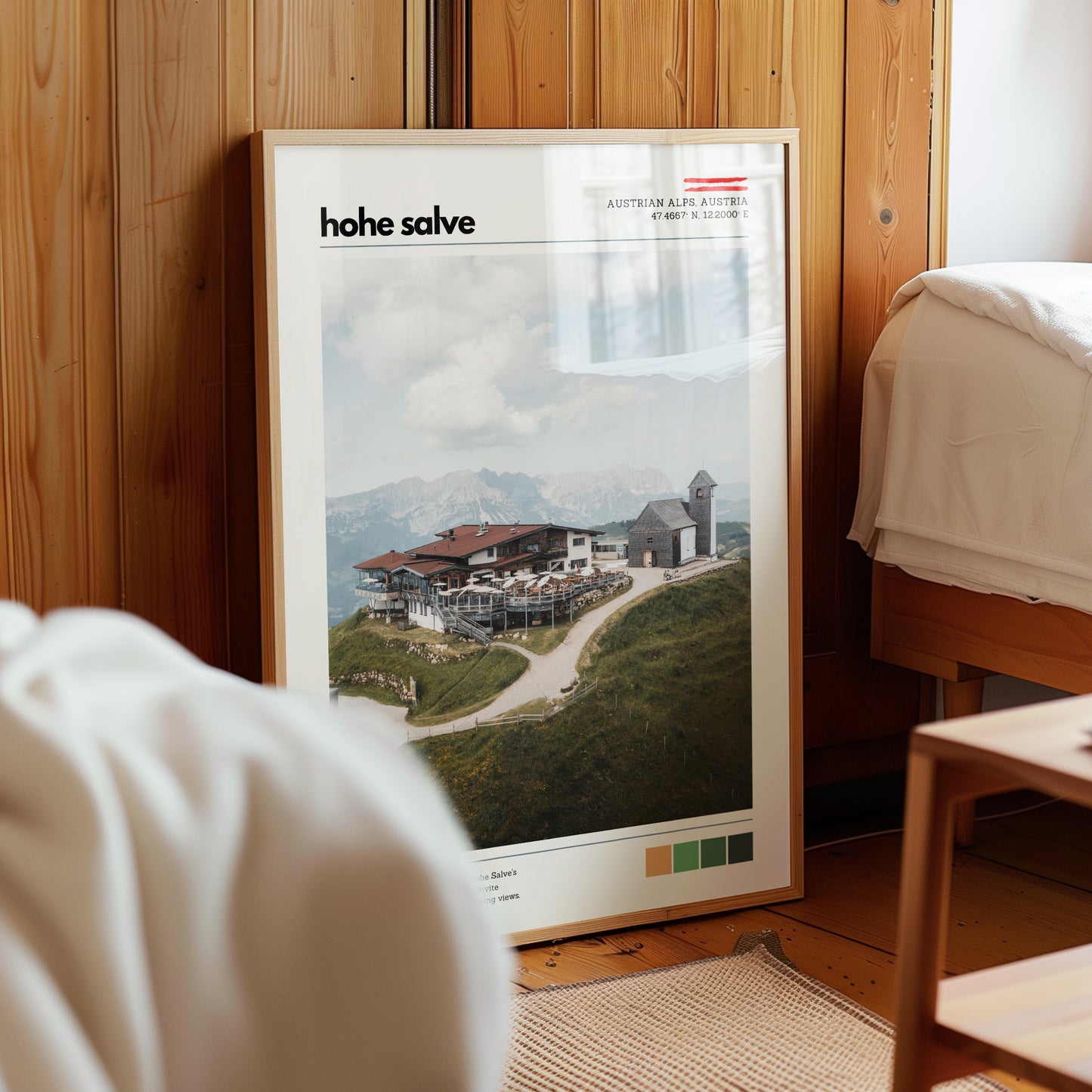 Hohe Salve location poster leaning against a wall in a warm alpine-inspired interior setting
