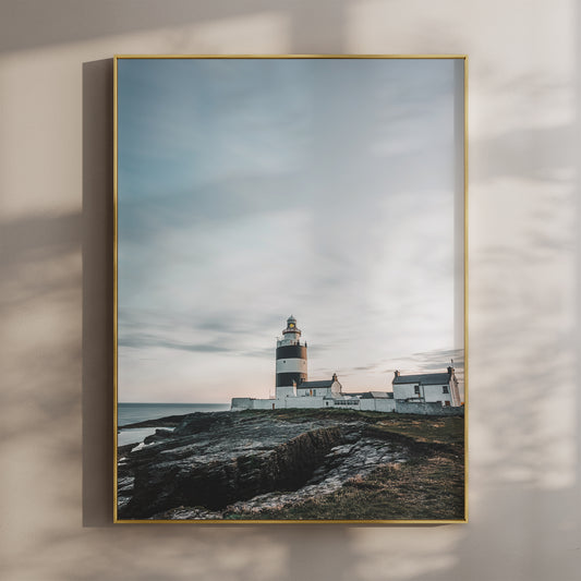 Hook Head Lighthouse wall art print featuring golden light on a coastal scene