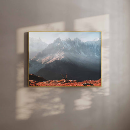 Ibex at sunrise with Mont Blanc in the background, framed in natural wood.