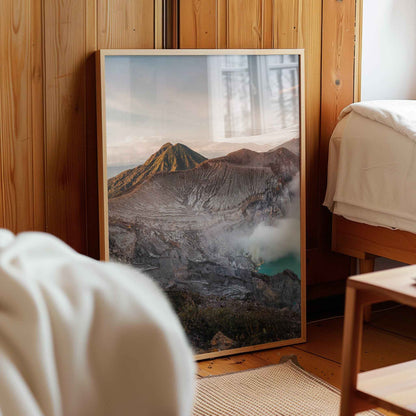 Ijen volcano crater lake Java Indonesia framed photography print leaning against wooden wall in cosy bedroom interior