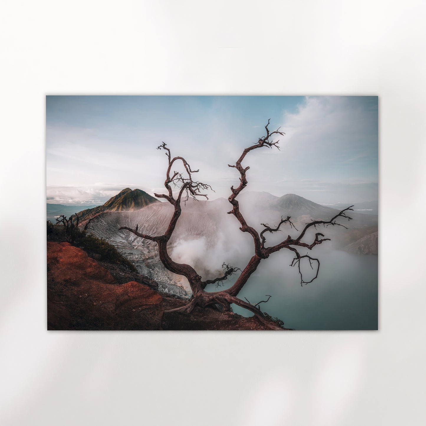 Ijen volcano dead tree framing turquoise acid crater lake East Java Indonesia landscape photography print unframed on white background