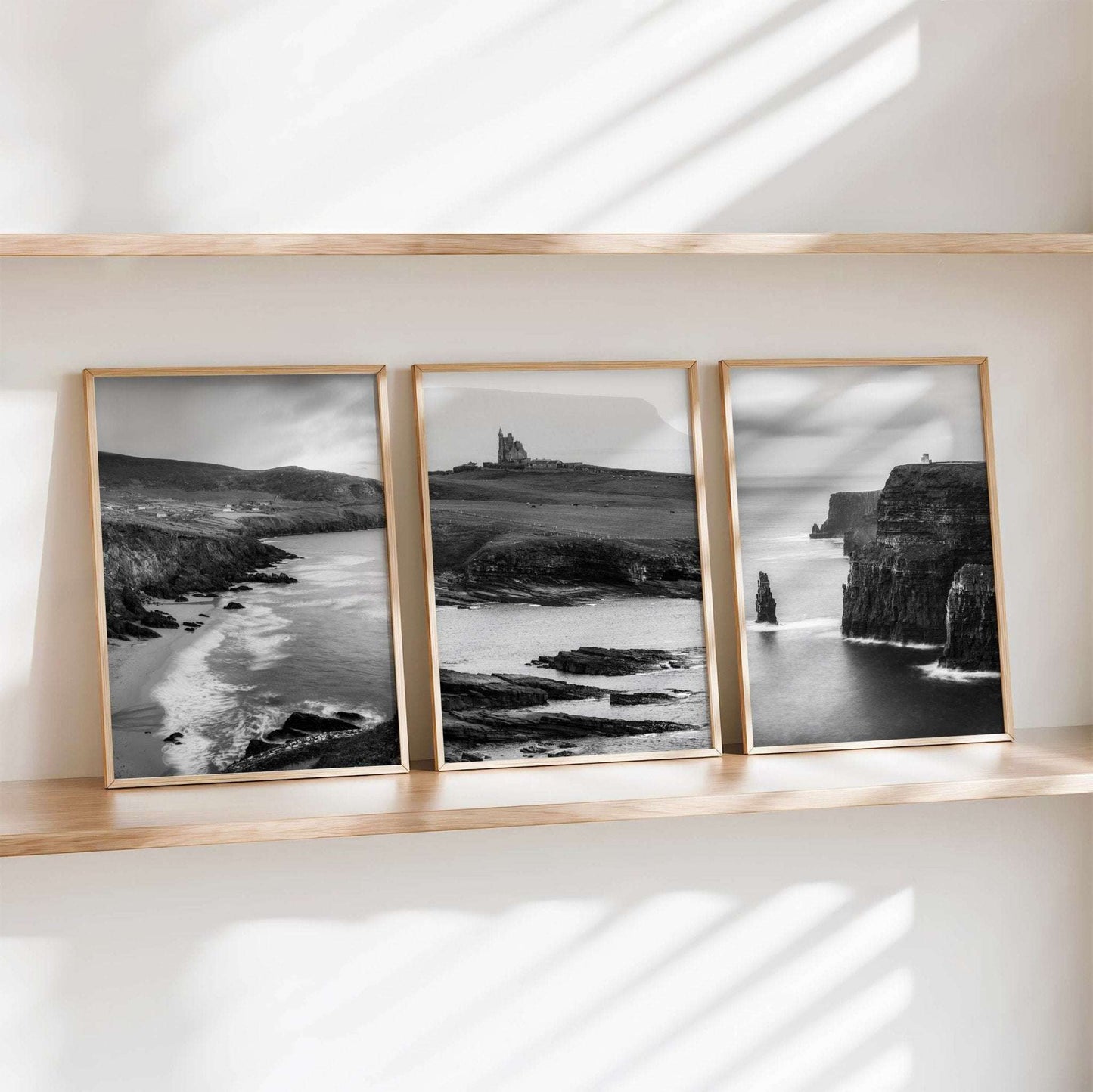 Ireland coastal landscape triptych in black and white featuring dramatic cliffs and shoreline scenes