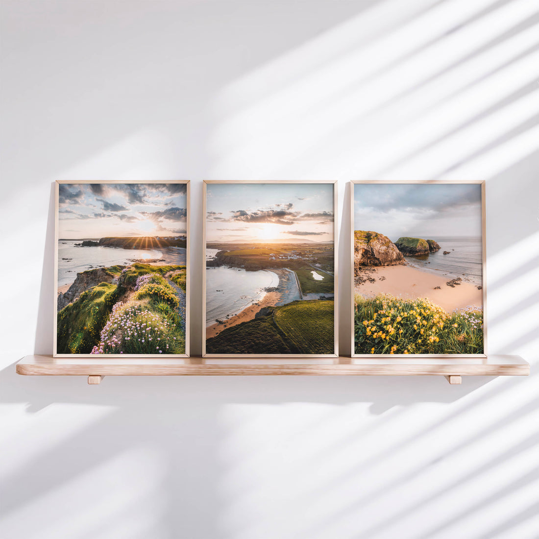 Annestown Beach wall art triptych on shelf with natural light and Irish coastal landscape