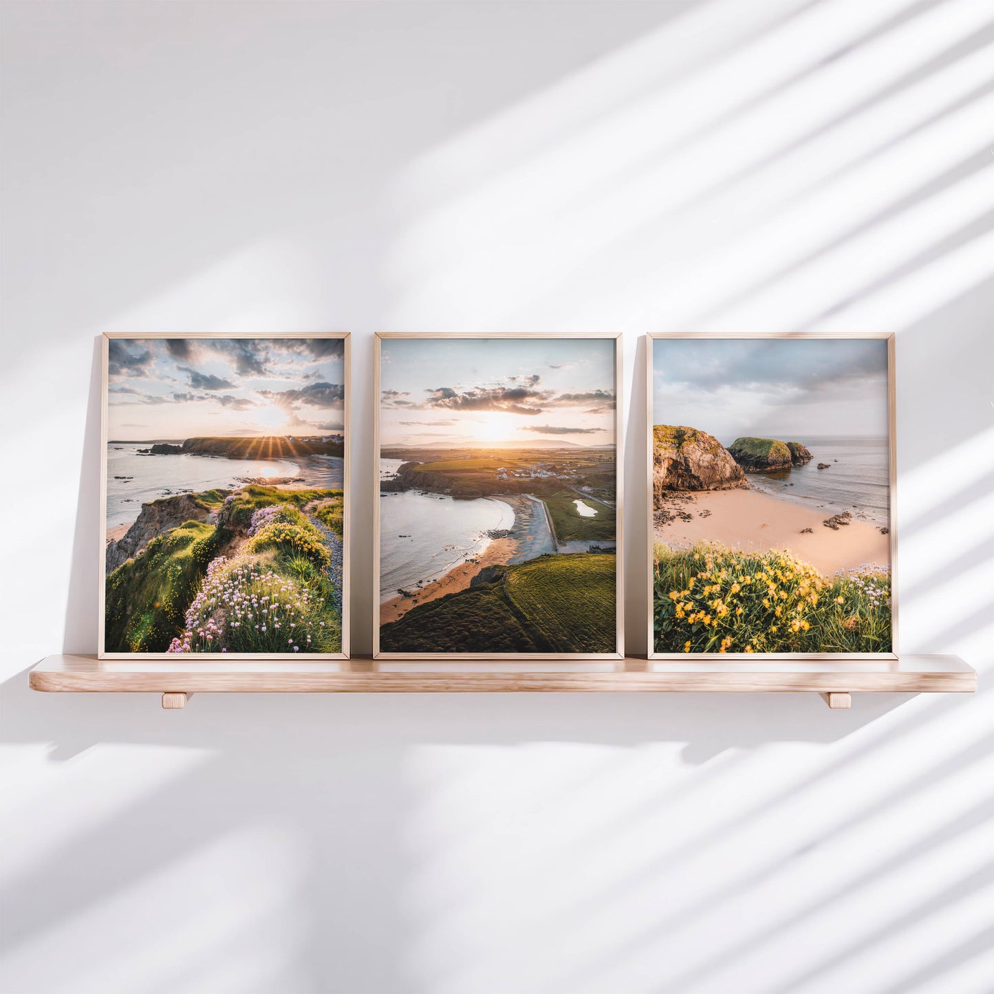 Annestown Beach wall art triptych on shelf with natural light and Irish coastal landscape
