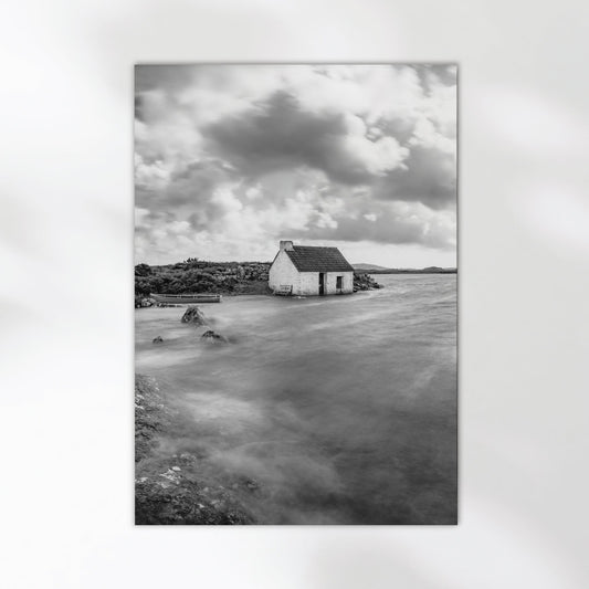Irish stormy coastal cottage print with dramatic sky and sea