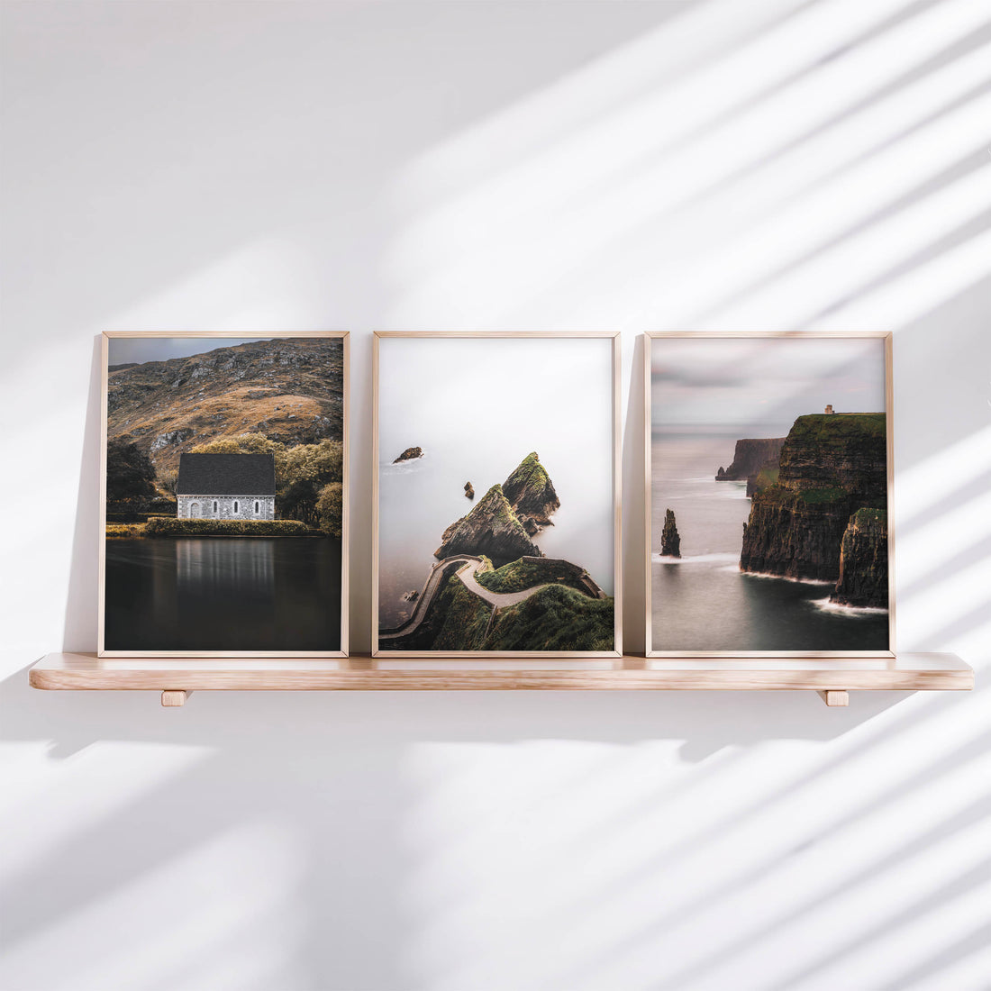 Framed Irish landscape wall art set of three prints displayed together in a modern interior