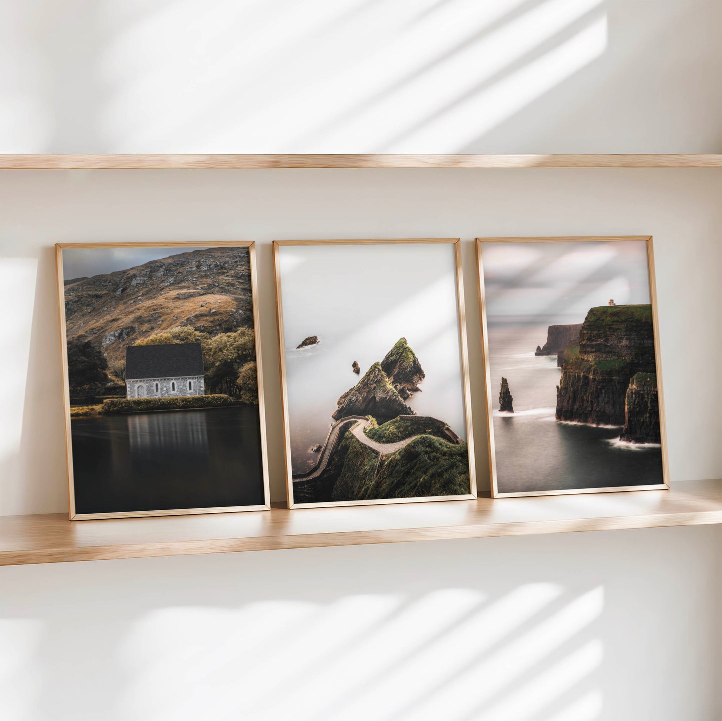 Irish wall art print set of three coastal and landscape photographs styled on a shelf