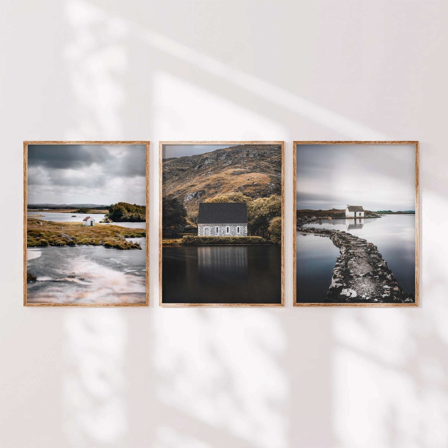 Irish wall art set of three featuring a Connemara countryside hut, Gougane Barra, and a fisherman’s bothy in a coordinated gallery arrangement