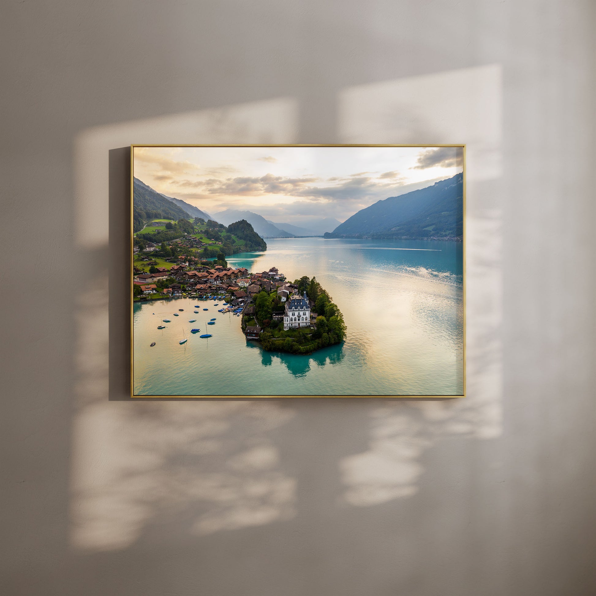 Iseltwald village and Lake Brienz in the soft morning light, featuring stunning Swiss alpine scenery.