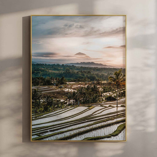 Jatiluwih rice terraces Bali wall art print with Mount Agung at sunset in gold floating frame mounted on beige wall with natural shadows