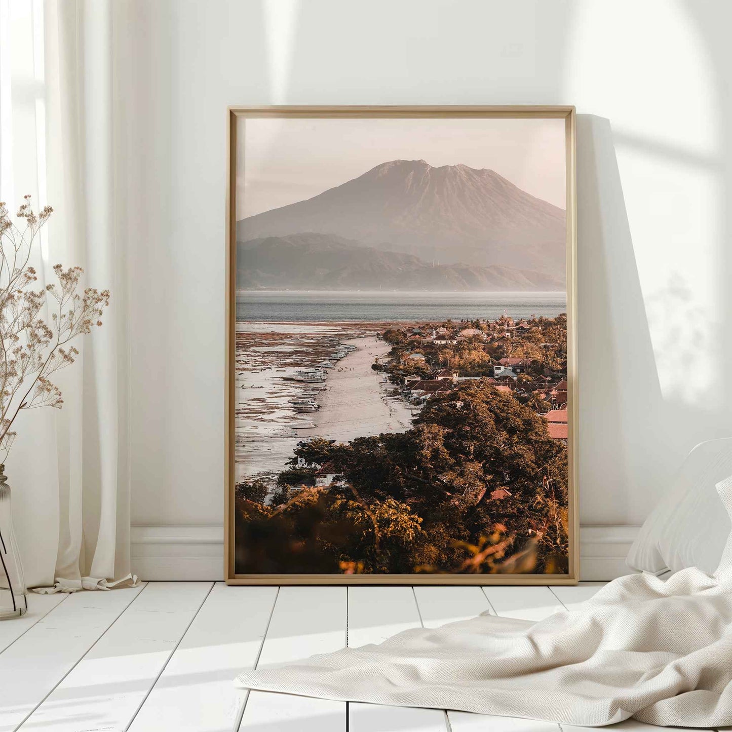 Jungutbatu Beach Nusa Lembongan large framed wall art print in natural wood frame leaning against white wall with dried flowers