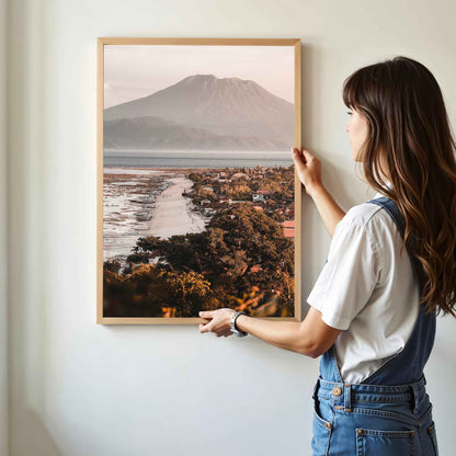 Woman hanging Jungutbatu Beach Nusa Lembongan framed art print with Mount Agung in natural oak wood frame on white wall