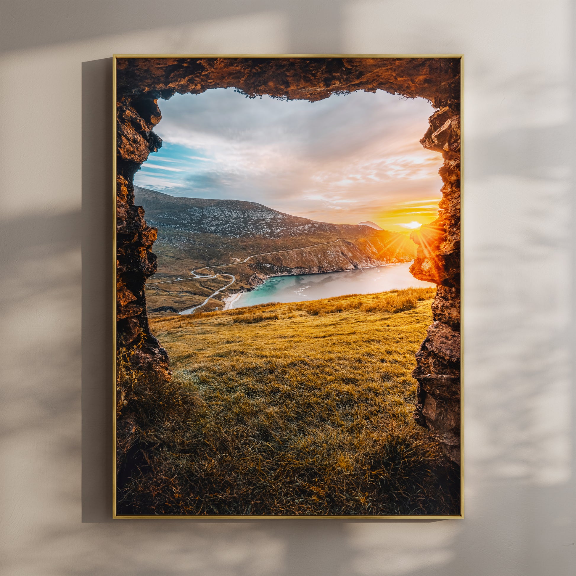 Fine art print of Keem Beach at sunset on Achill Island with golden light on the coastline.