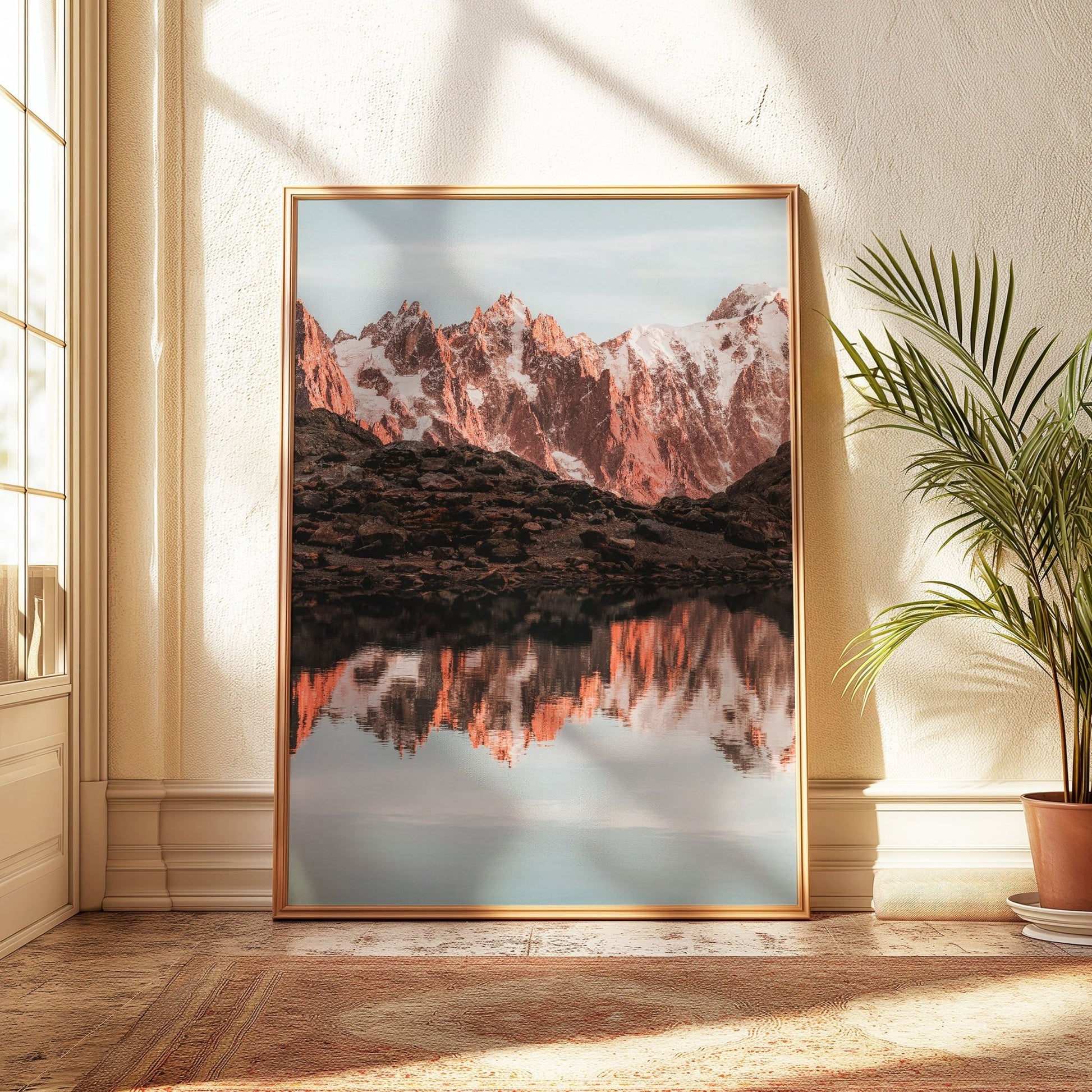 Framed artwork showing Lac Blanc with reflected peaks bathed in warm sunlight.