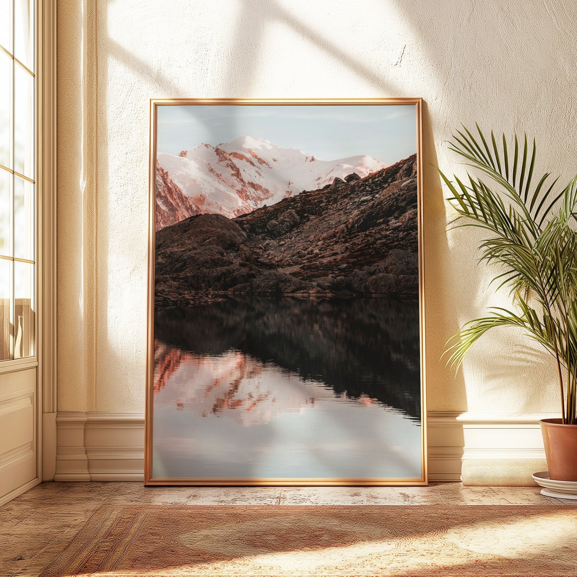 Framed photograph of Lac Blanc with snowy alpine peaks and a crystal-clear reflection in the water.