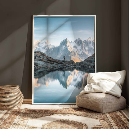 Stunning Lac Blanc reflecting the sharp peaks of the Aiguilles de Chamonix, captured in soft evening light.