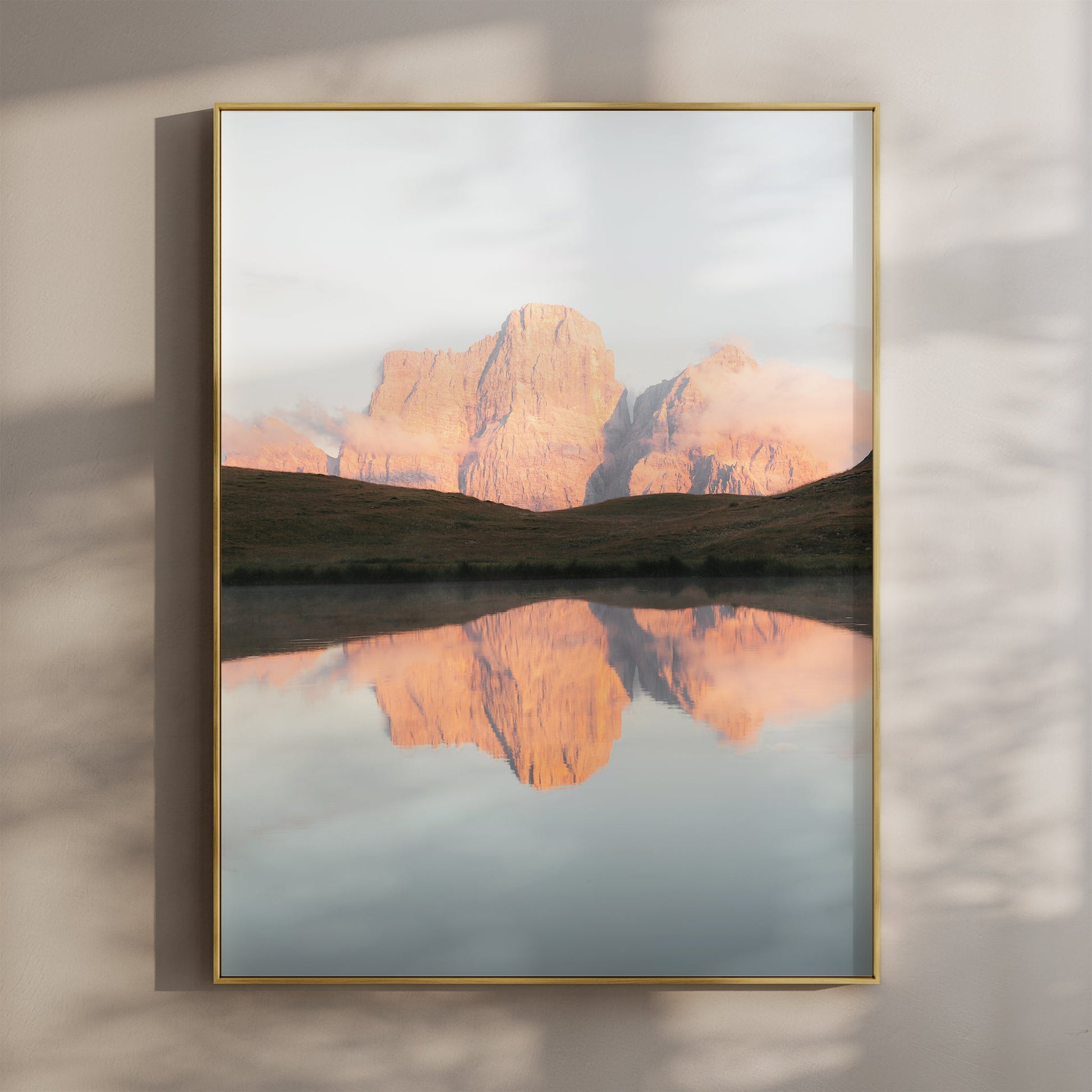 Sunrise view of Lago delle Baste with mountain reflection in the Dolomites